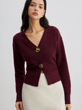 Gilet court en maille boutons métalliques femme