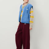 Gilet sans manches boutonné en laine femme