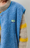 Gilet sans manches boutonné en laine femme