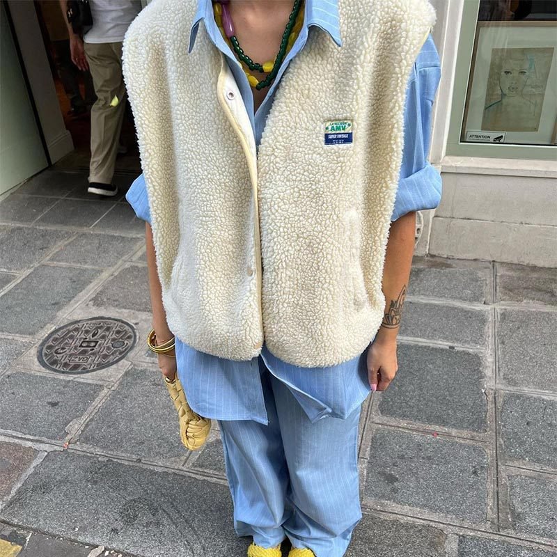 Gilet sans manches boutonné en laine femme
