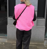 Gilet sans manches boutonné en laine femme