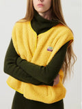 Gilet sans manches boutonné en laine femme
