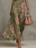 Robe halter fleurie taille marquée jupe fluide