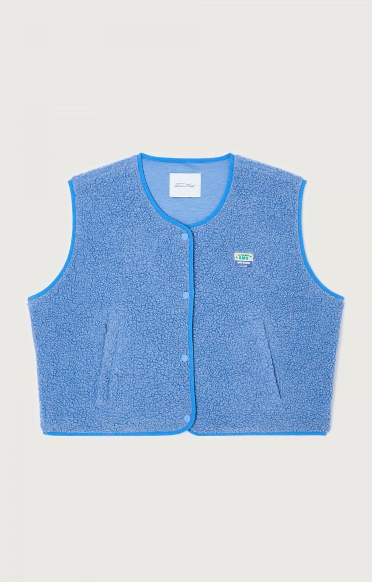 Gilet sans manches boutonné en laine femme