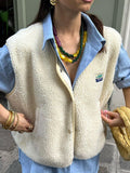 Gilet sans manches boutonné en laine femme