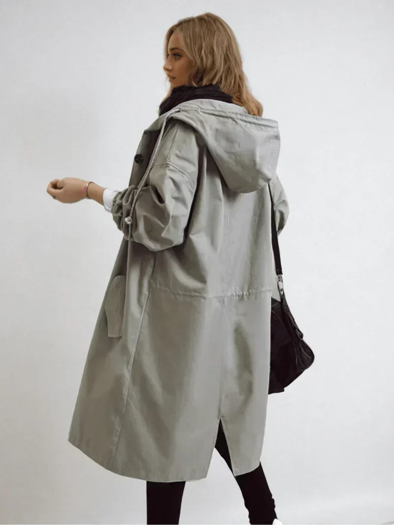 Imperméable femme à capuche et ceinture coupe-vent