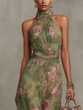Robe halter fleurie taille marquée jupe fluide
